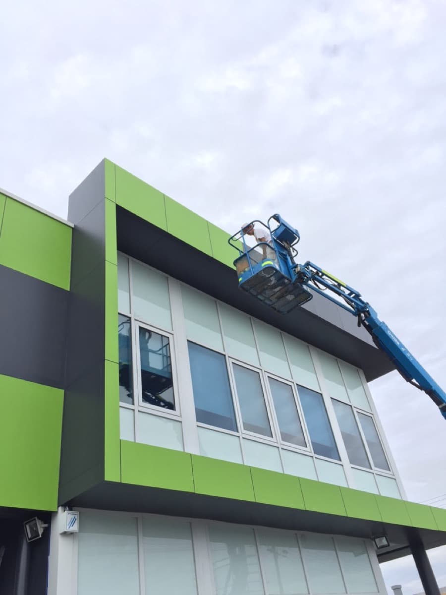 Exterior painting from an elevated work platform
